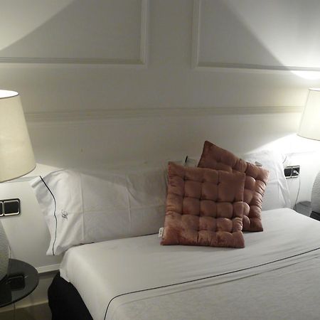 Apartamentos Manzana Madrid Habitación foto
